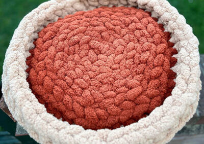 Pet Bed Terracotta and cream round close up