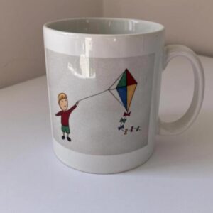 Boy with kite mug