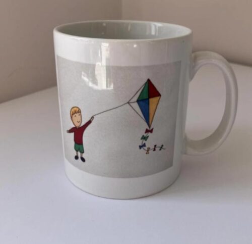 Boy with kite mug
